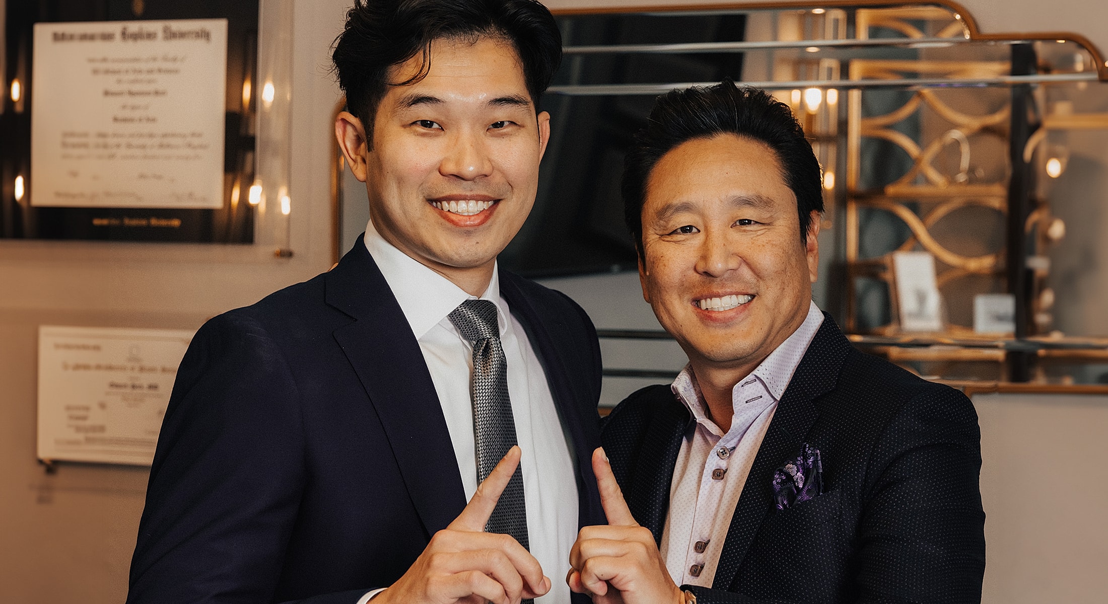 Two smiling men posing for a photo.