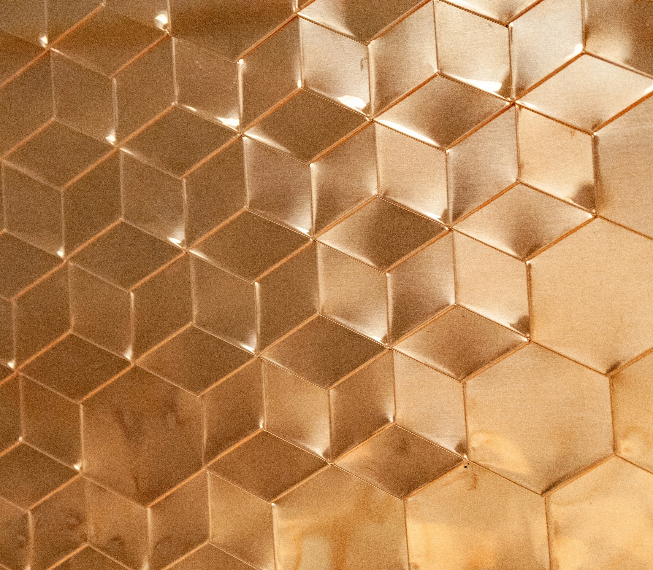 Copper hexagonal pattern with shiny finish.